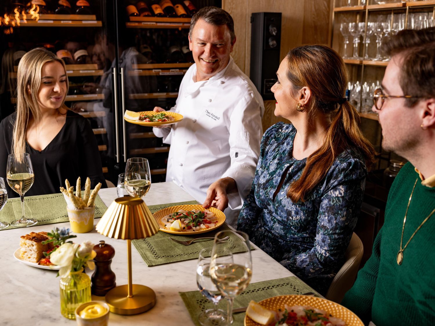 Theo Randall serving dinner at chefs table
