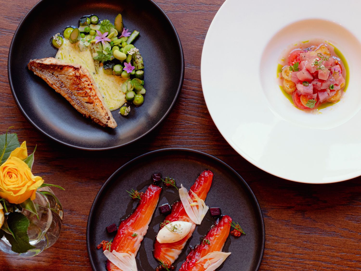 various dishes from fitz brasserie including fish