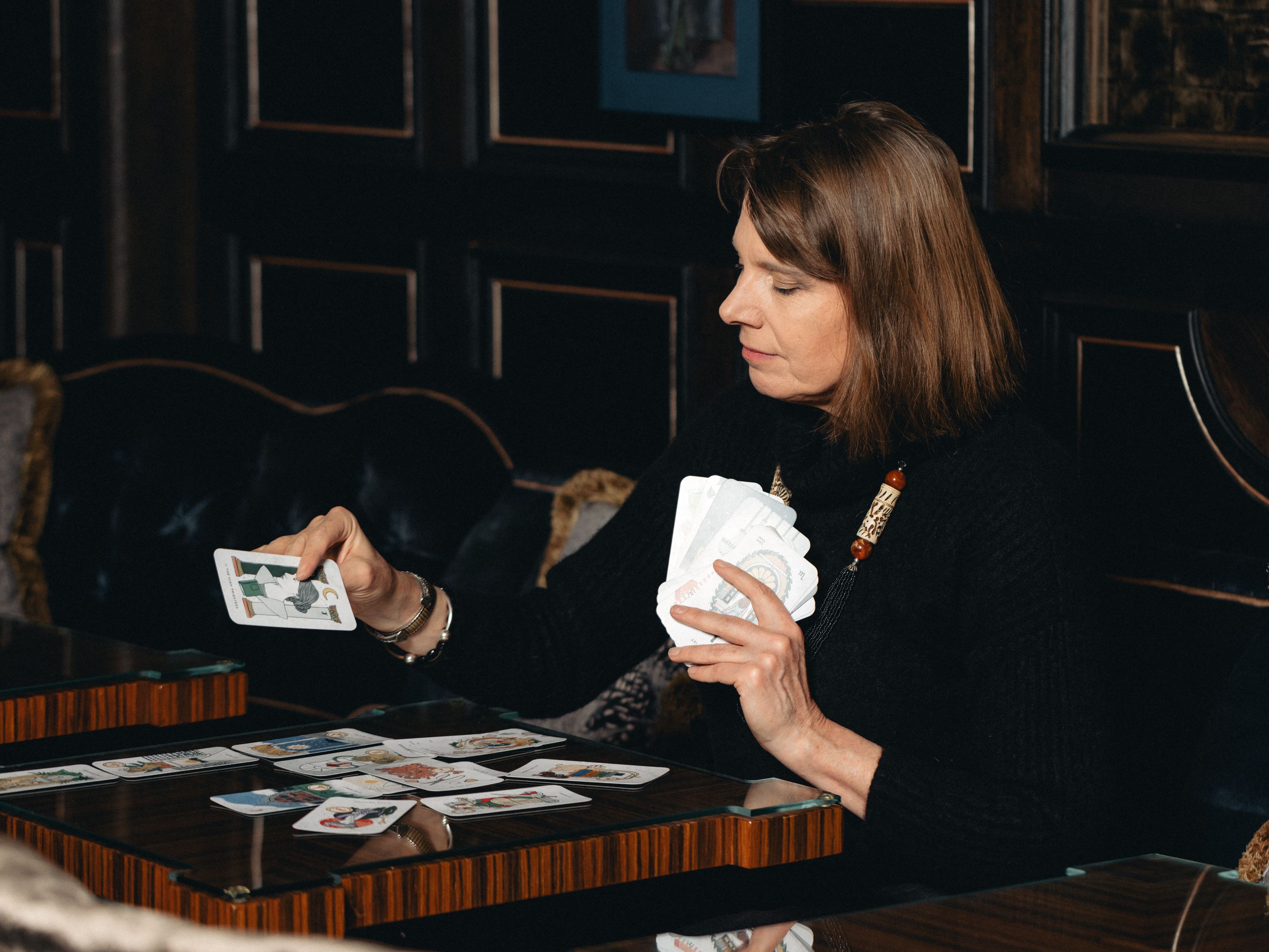 Woman using tarot cards