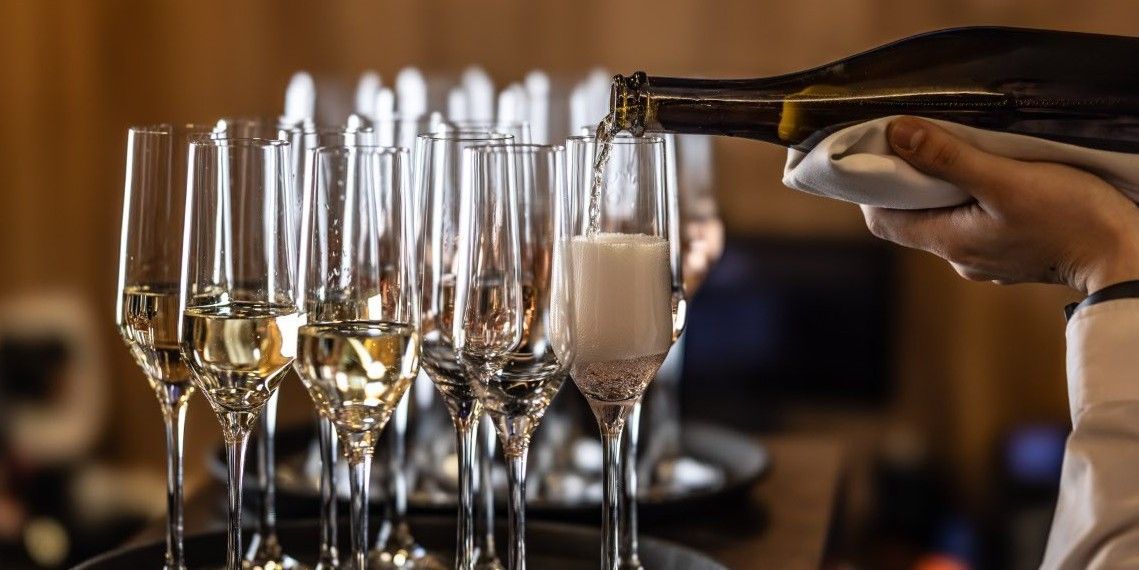 pouring fizz into glasses