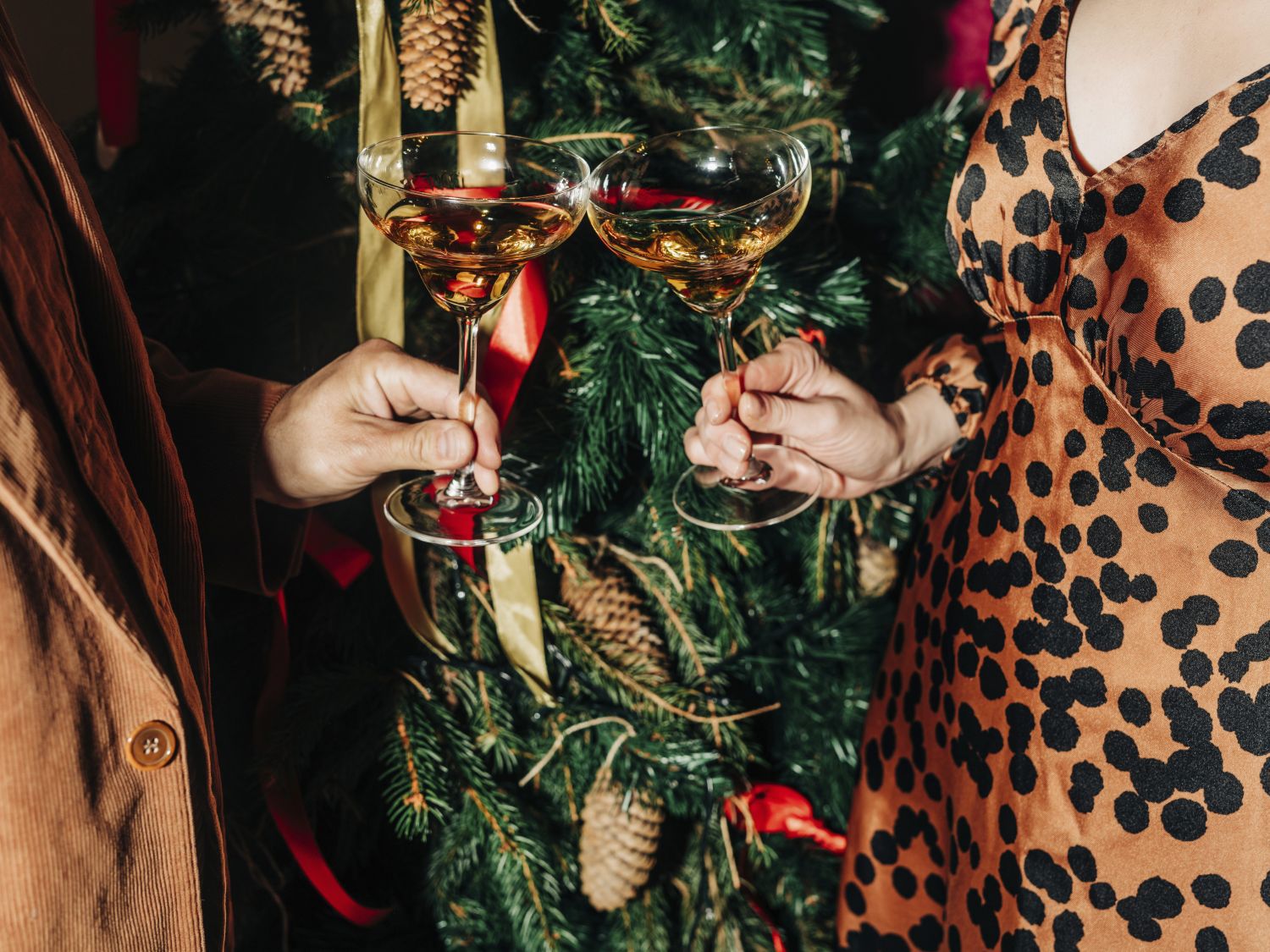 holding martinis