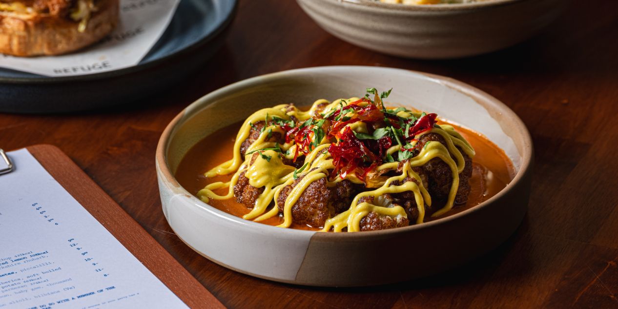 Plated dishes at Refuge restaurant