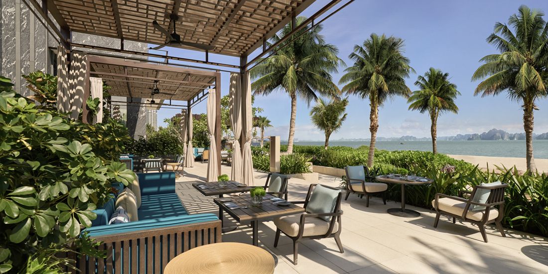 A serene beachfront dining escape where tropical views and elegant comfort come together.