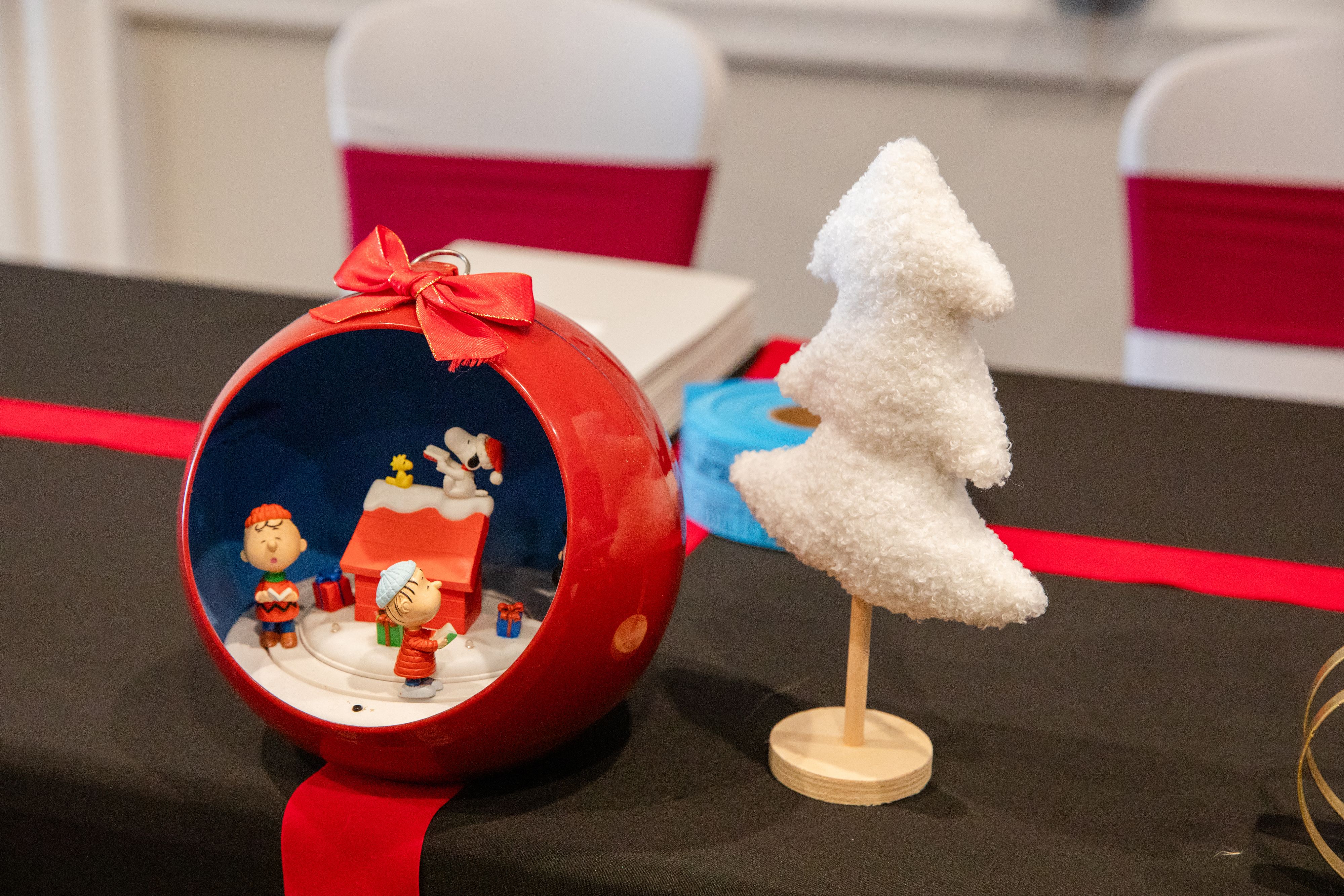 Charlie Brown holiday centerpiece with mini white Christmas tree