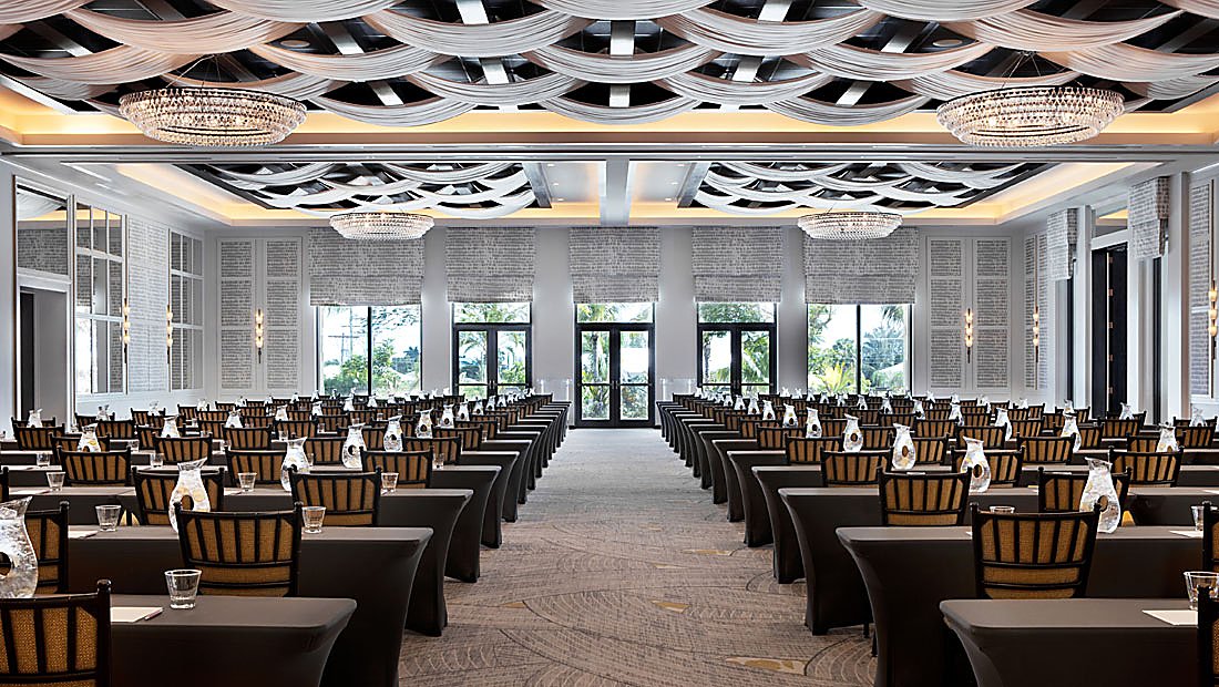 Large Banquet Style Meeting Room with Draped Cloth Decorated Ceiling 