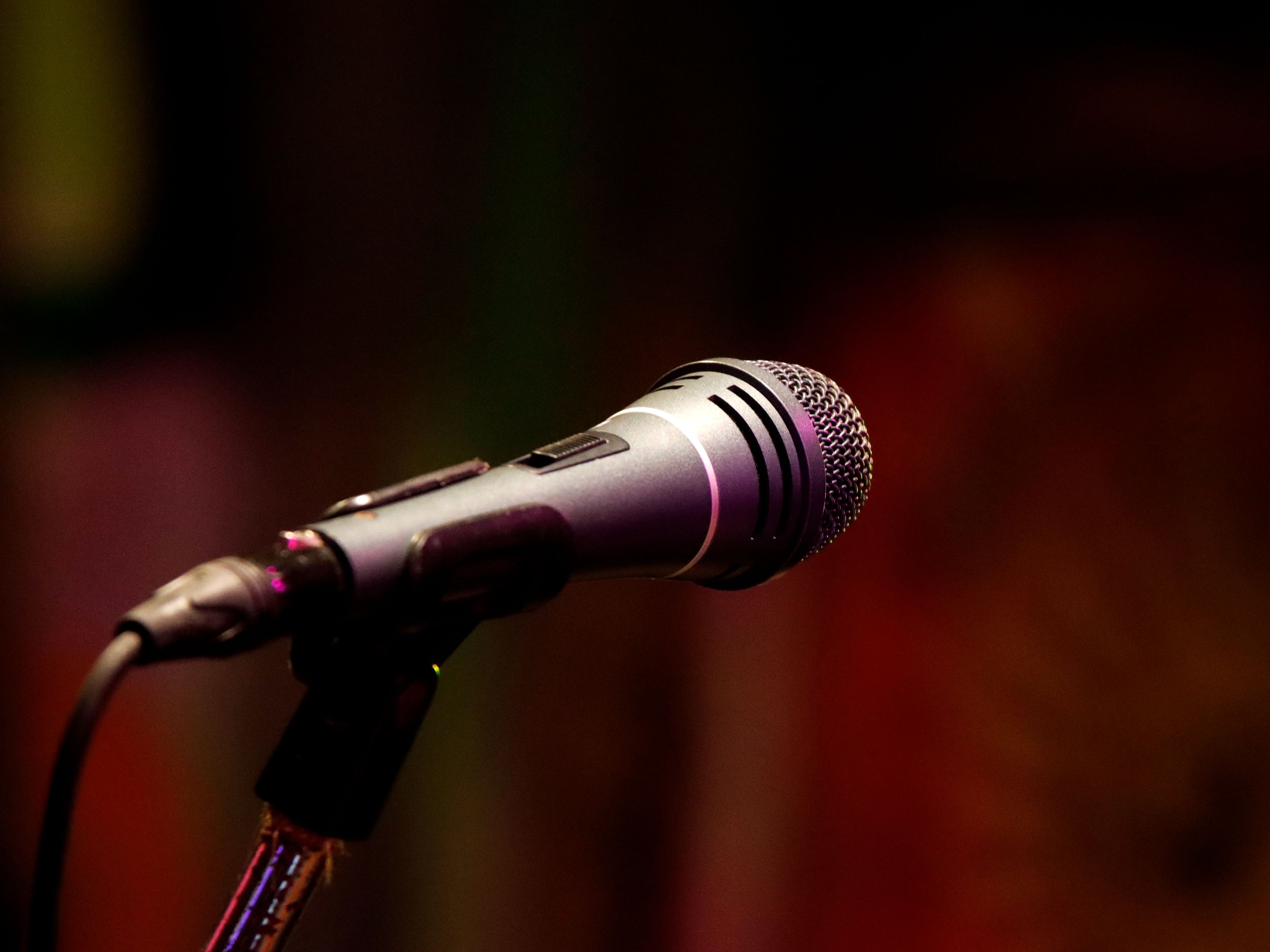 Microphone on a stand on stage.