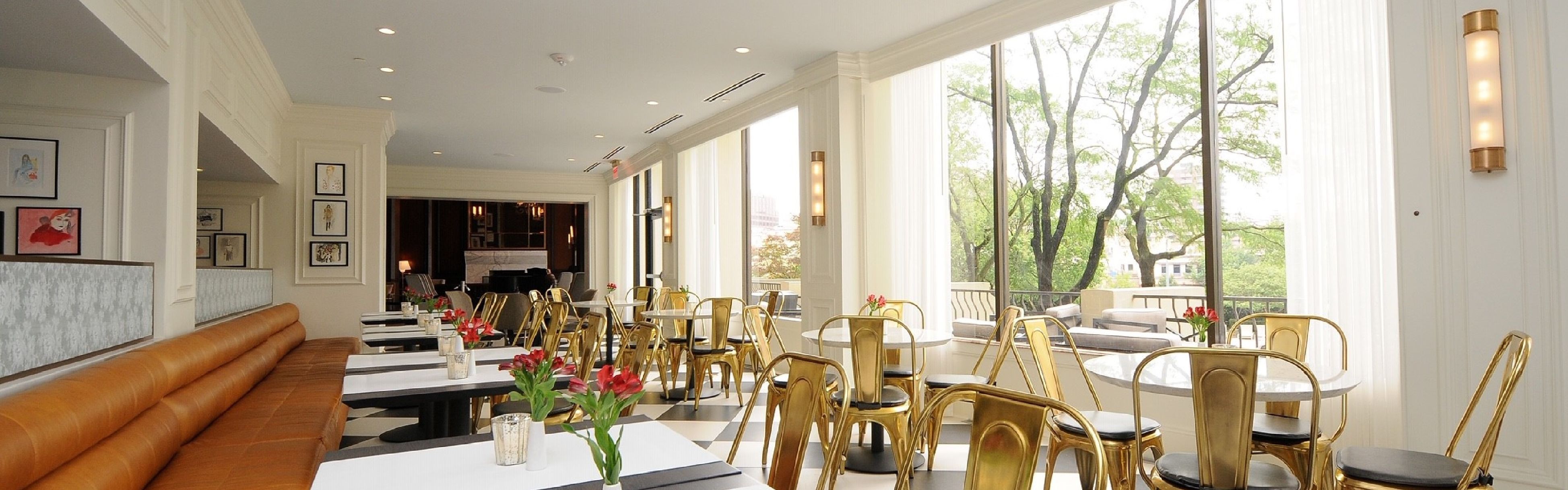 Seating area with cosy sofa and armchairs in wellington lounge.