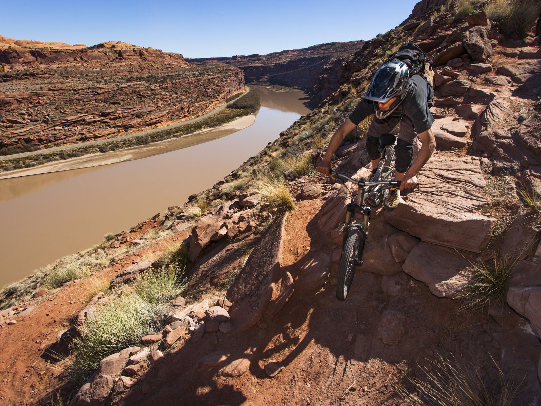 Man biking on rough terrain