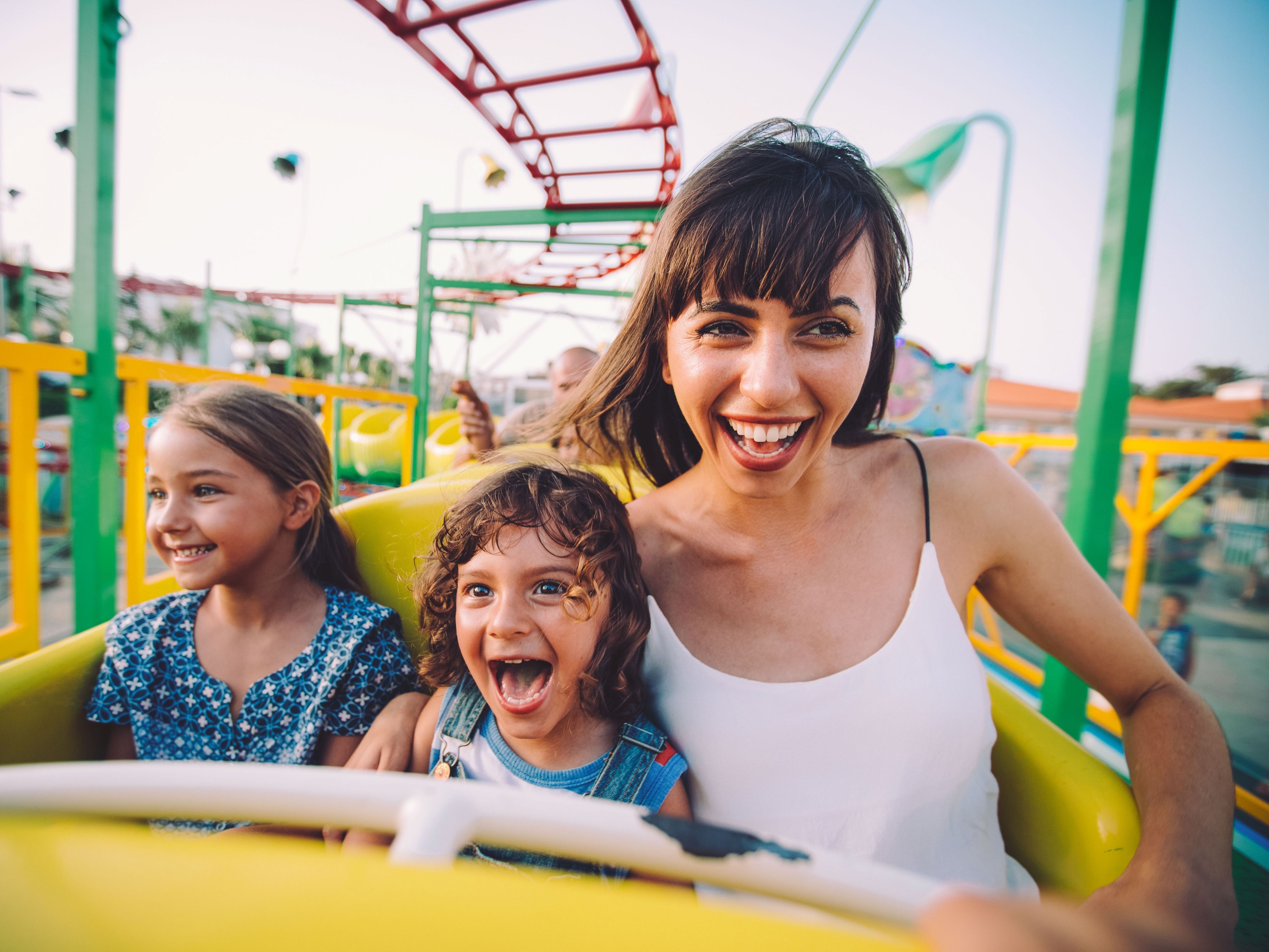 Mother and daughters on a rollercoaster