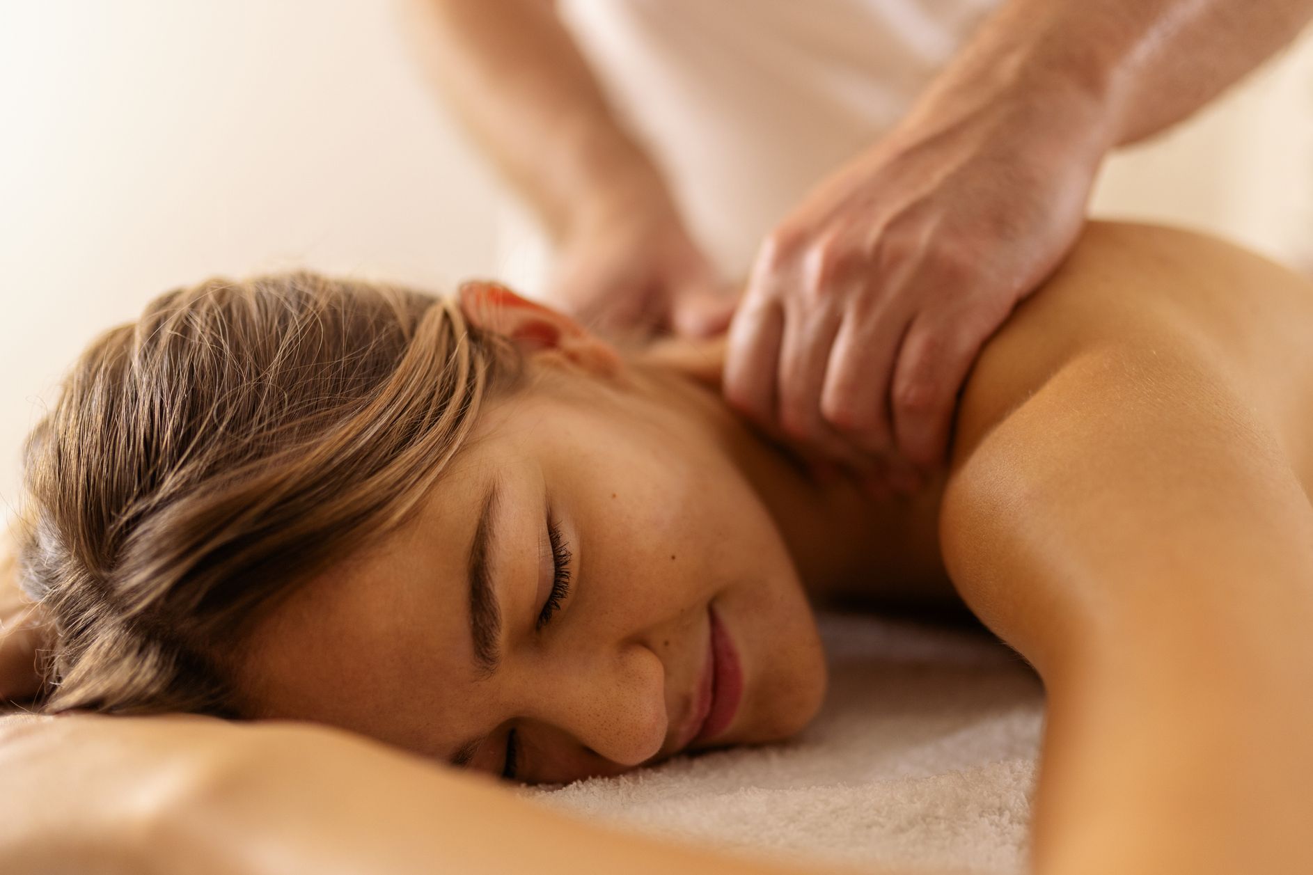 Woman receiving a massage at the spa.