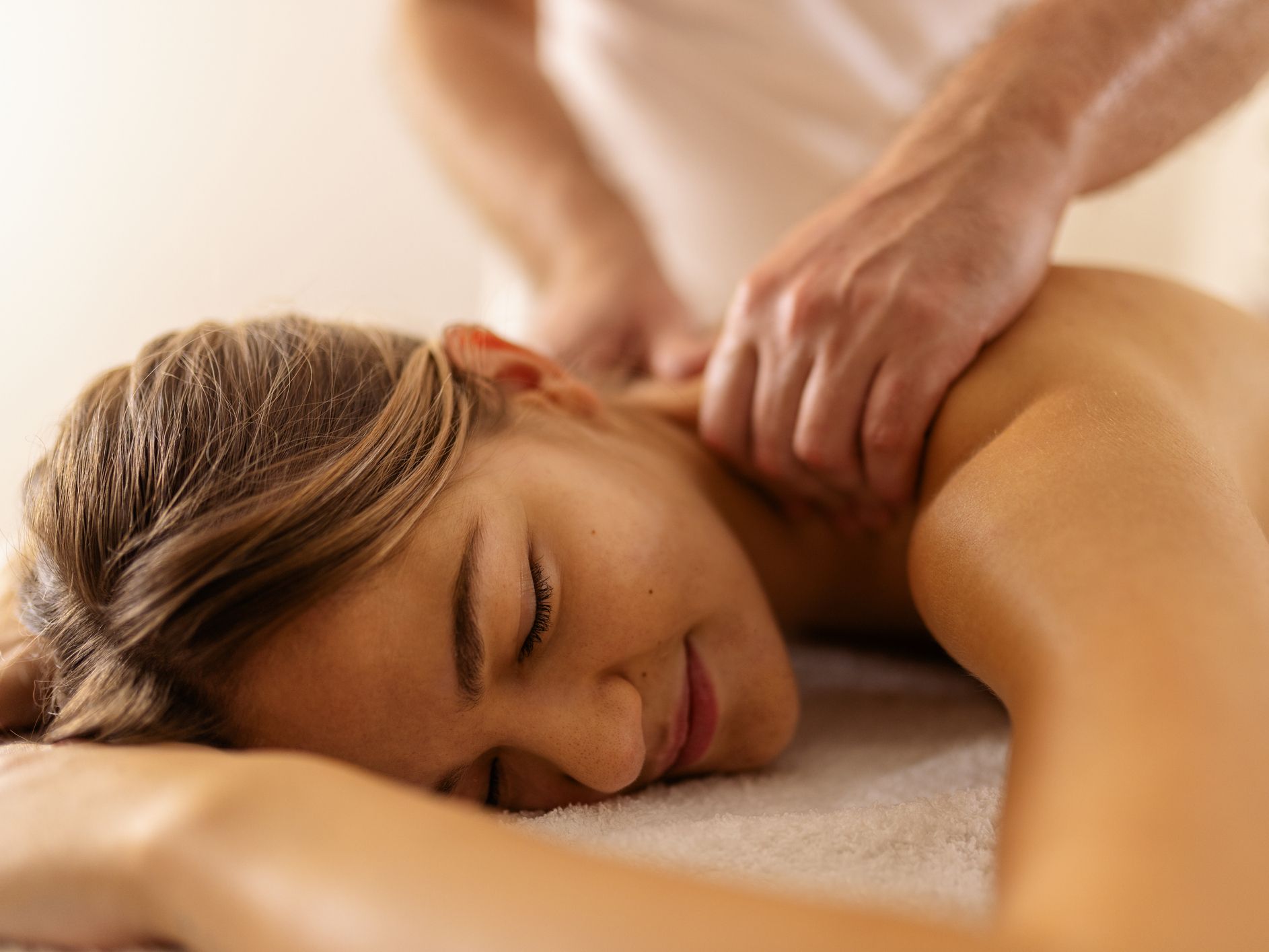 Woman receiving a massage at the spa.