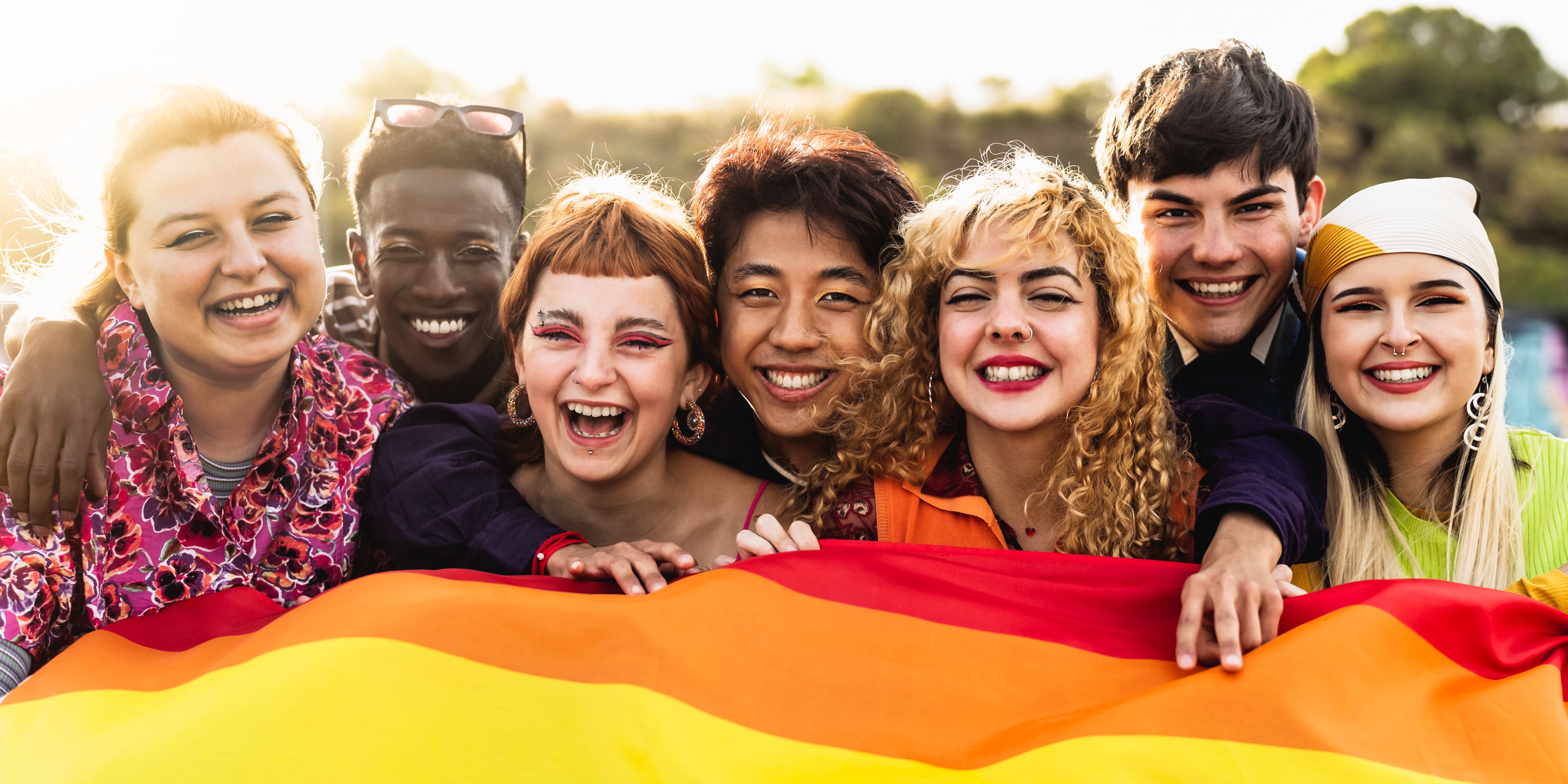 pride festival attendees with flag