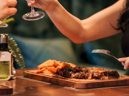 Steak dinner with wine.