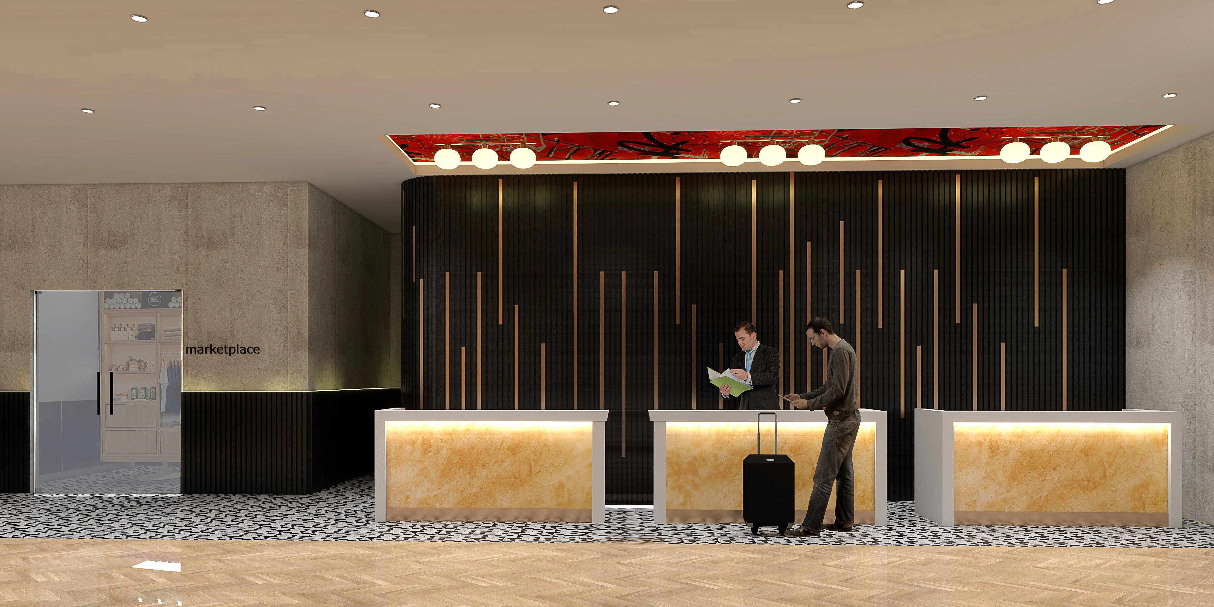 Front desk and Marketplace with guests
