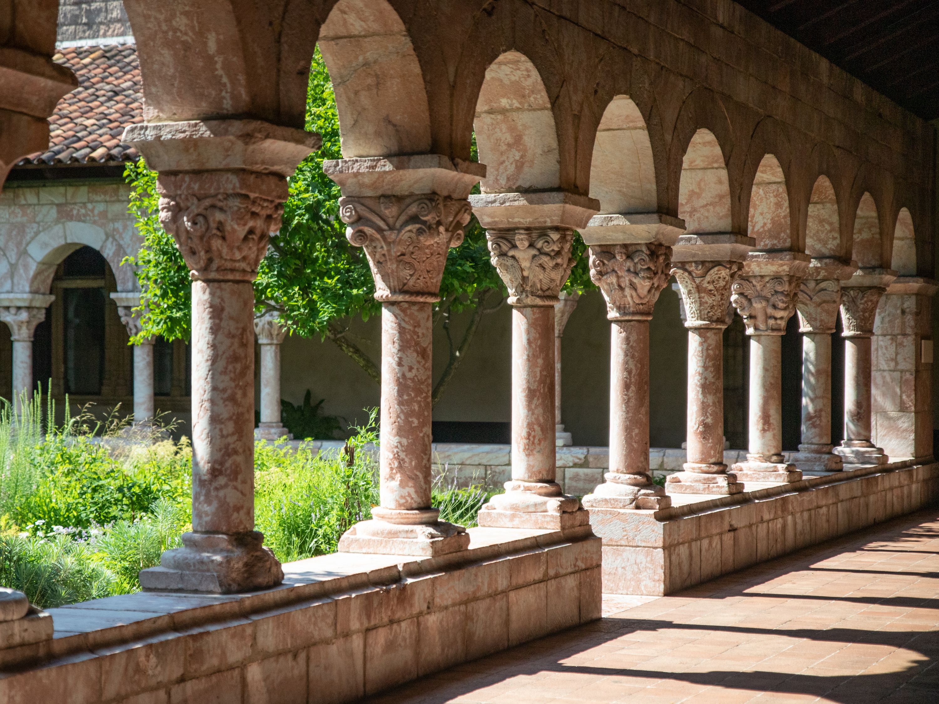 Exterior View of the Met Cloisters in Washington Height Manhattan with architectural details and garden.