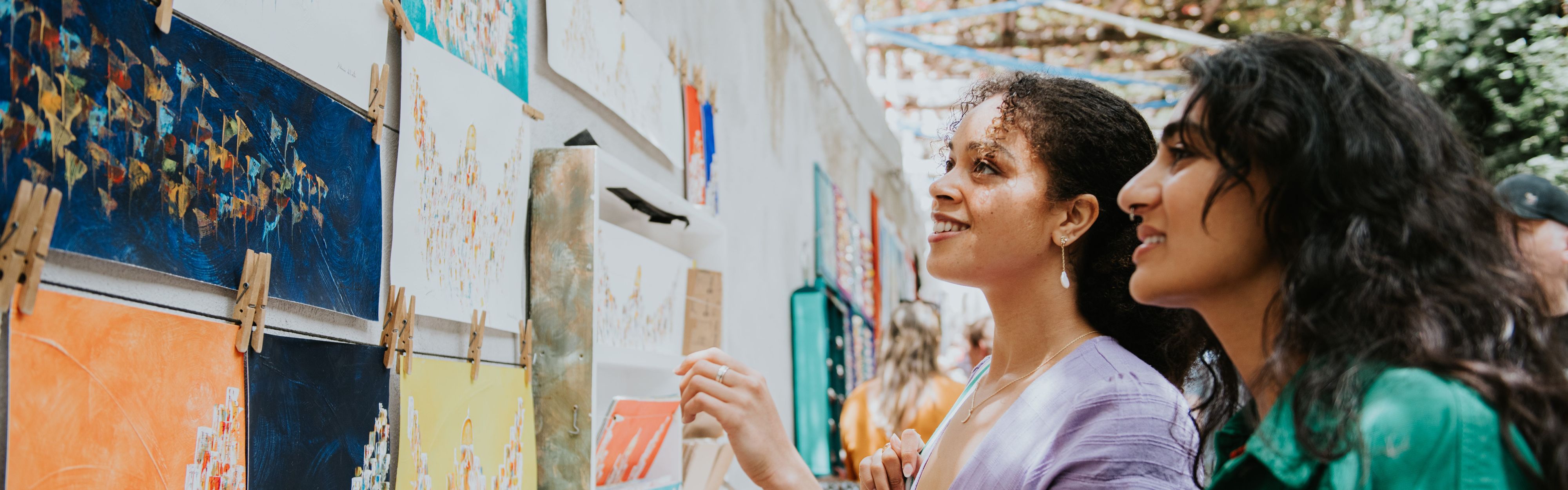 woman looking at art outside