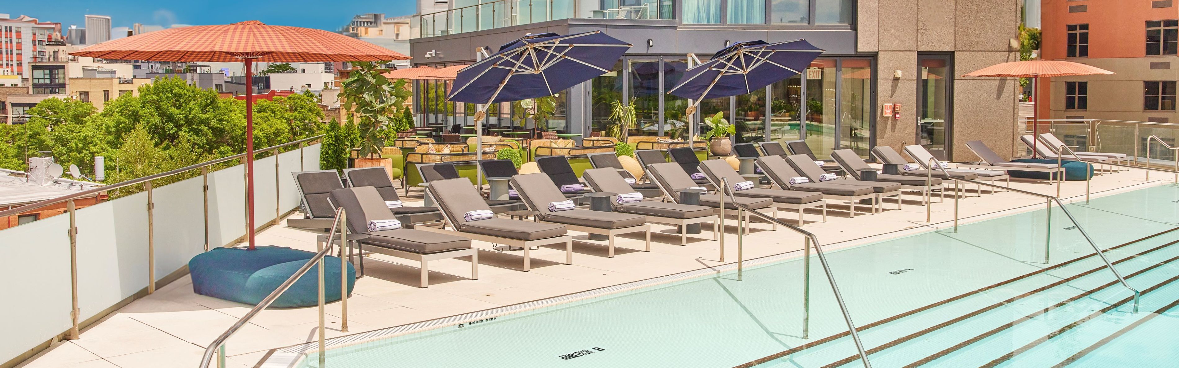 Outdoor pool on the 4th floor with sweeping views of Manhattan