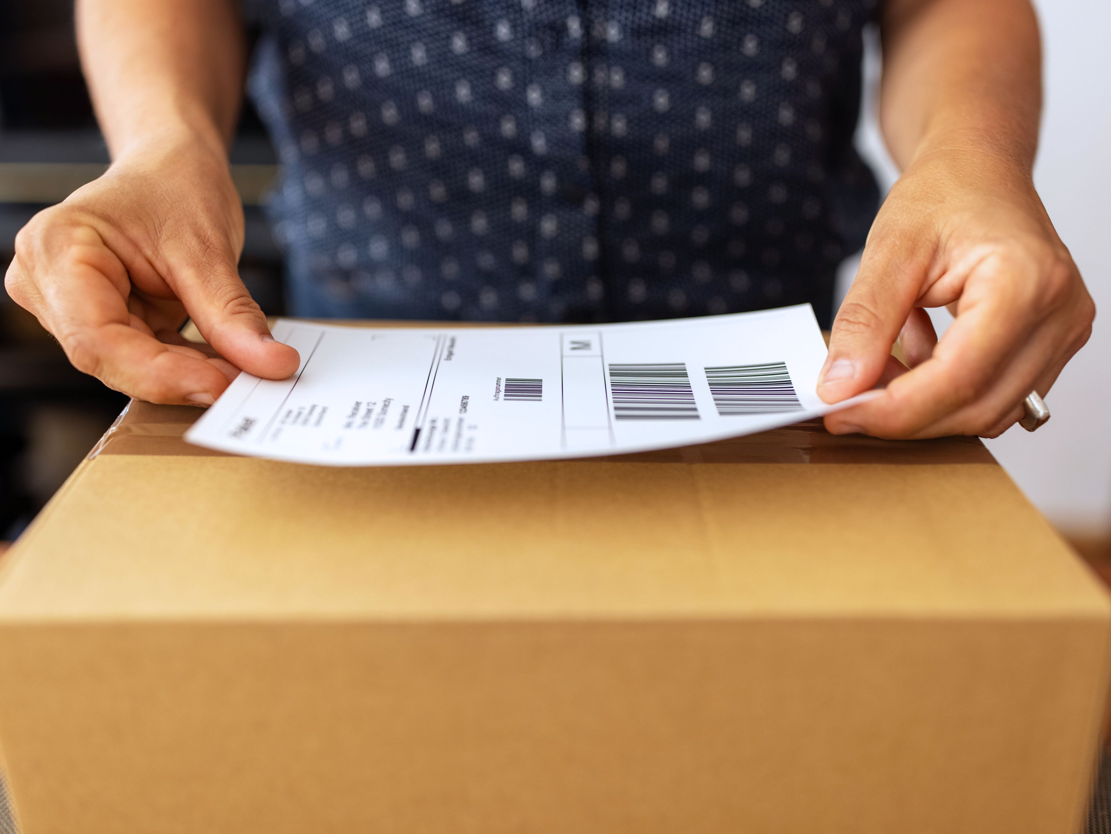 Woman packing a box