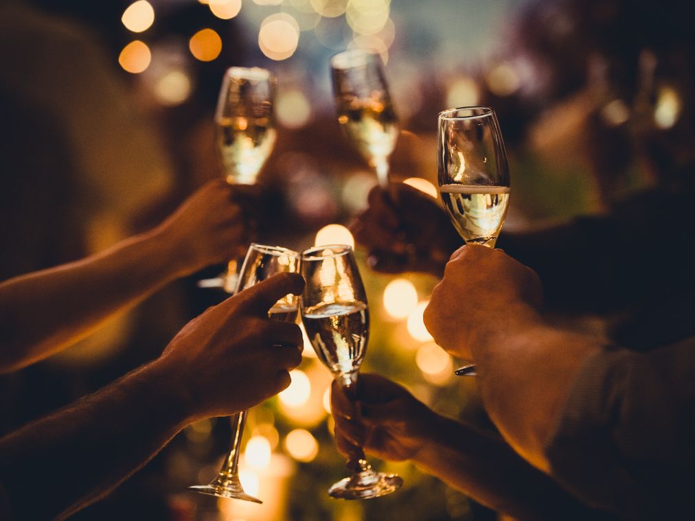 People cheering with champagne