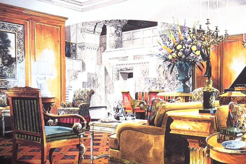Vintage hotel lounge with elegant furnishings, fireplace, and floral arrangement
