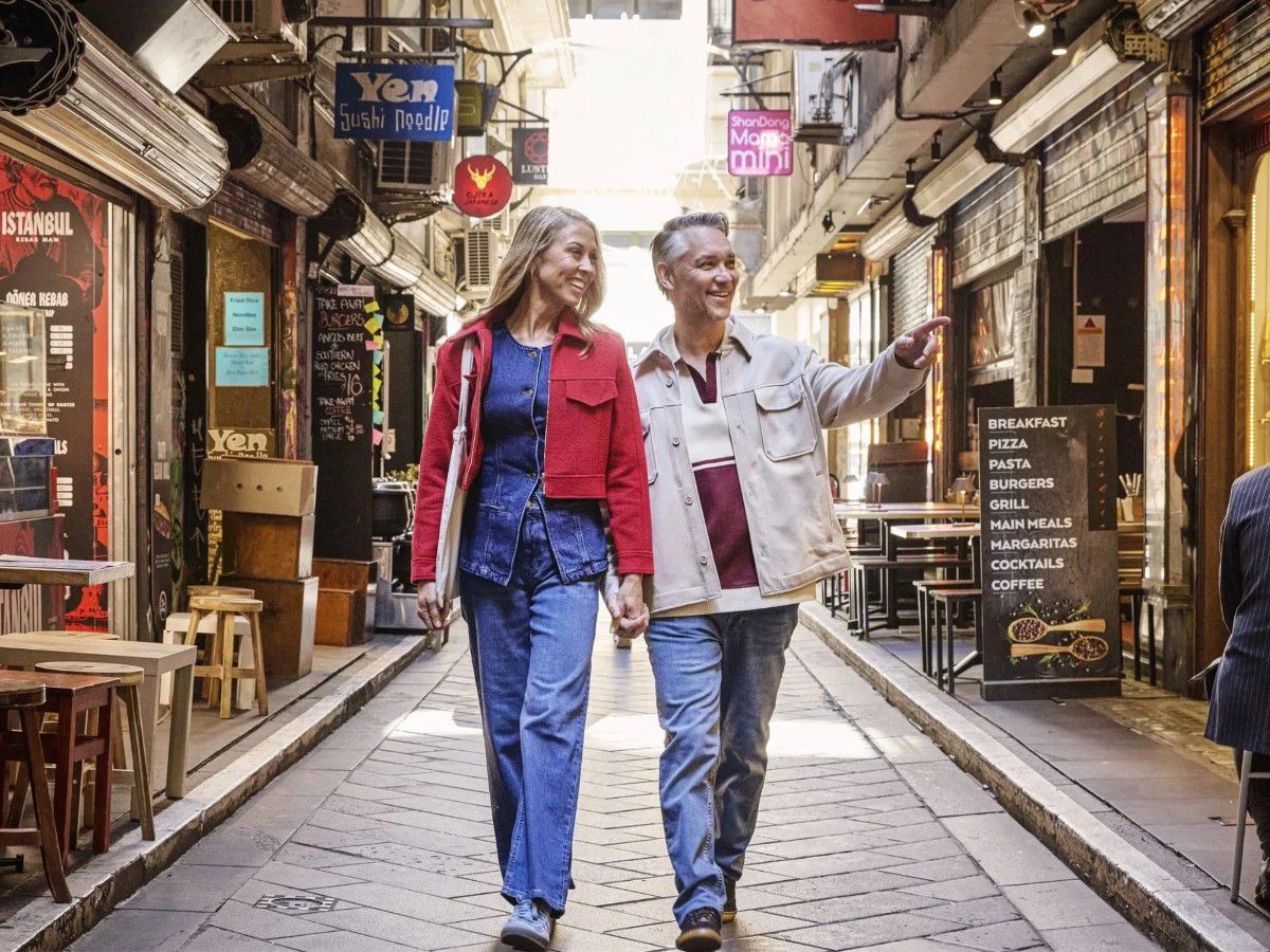 Vibrant pedestrian street with shops and outdoor cafés