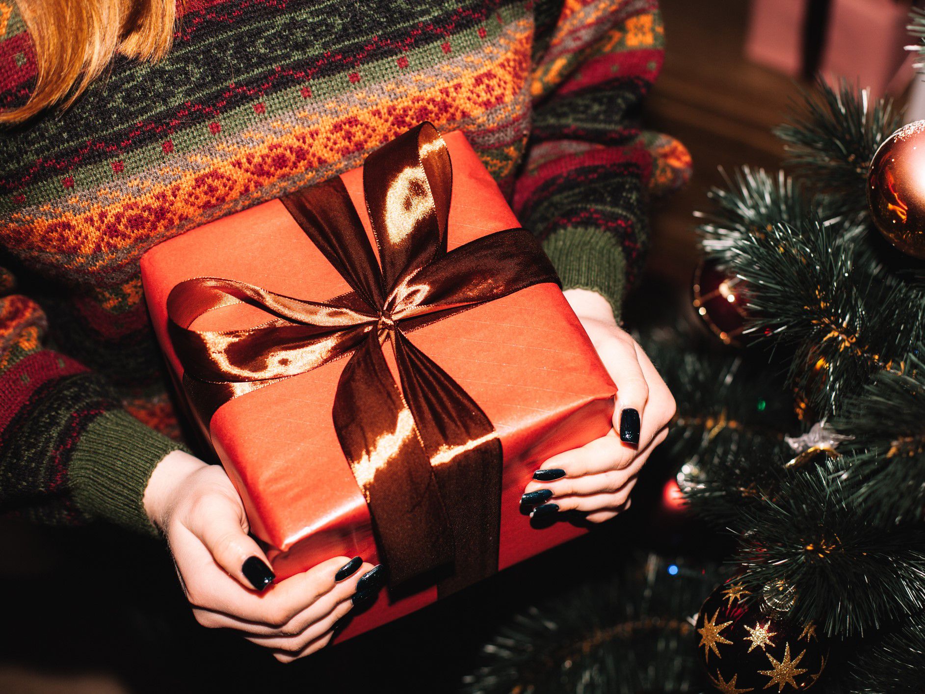 A guest holding a present