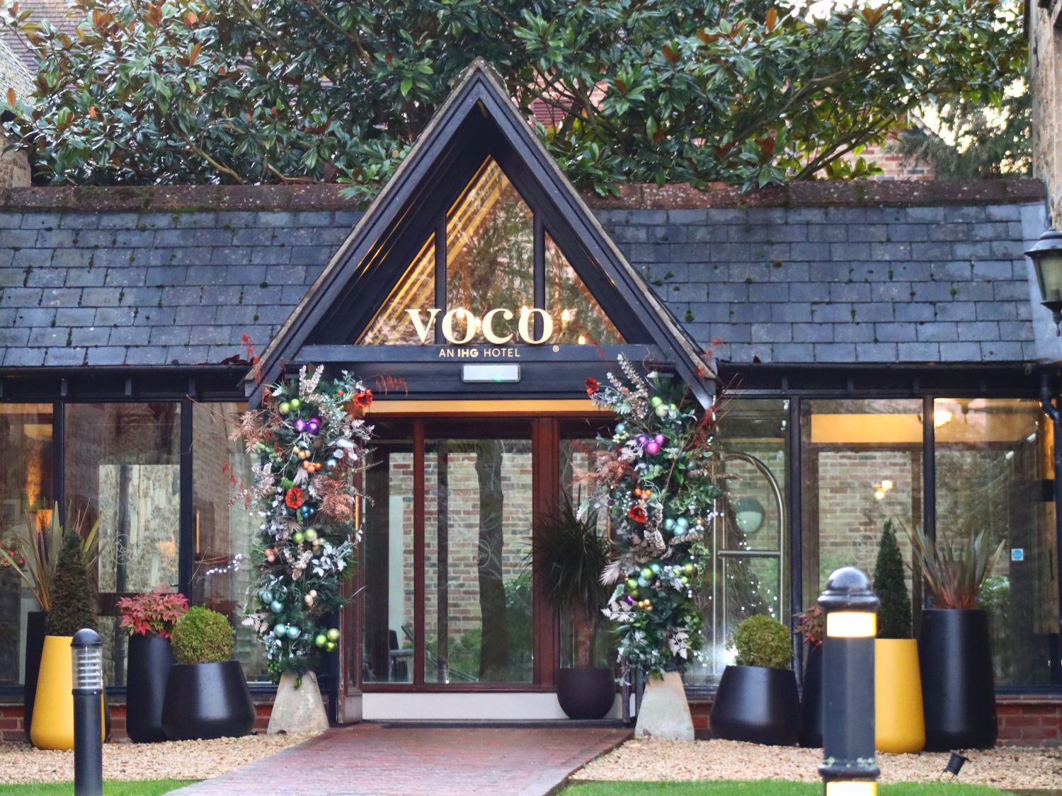 voco entrance with christmas trees