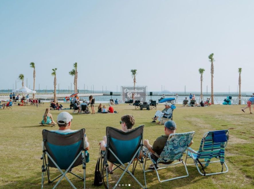 Watch live music on the green overlooking the ocean
