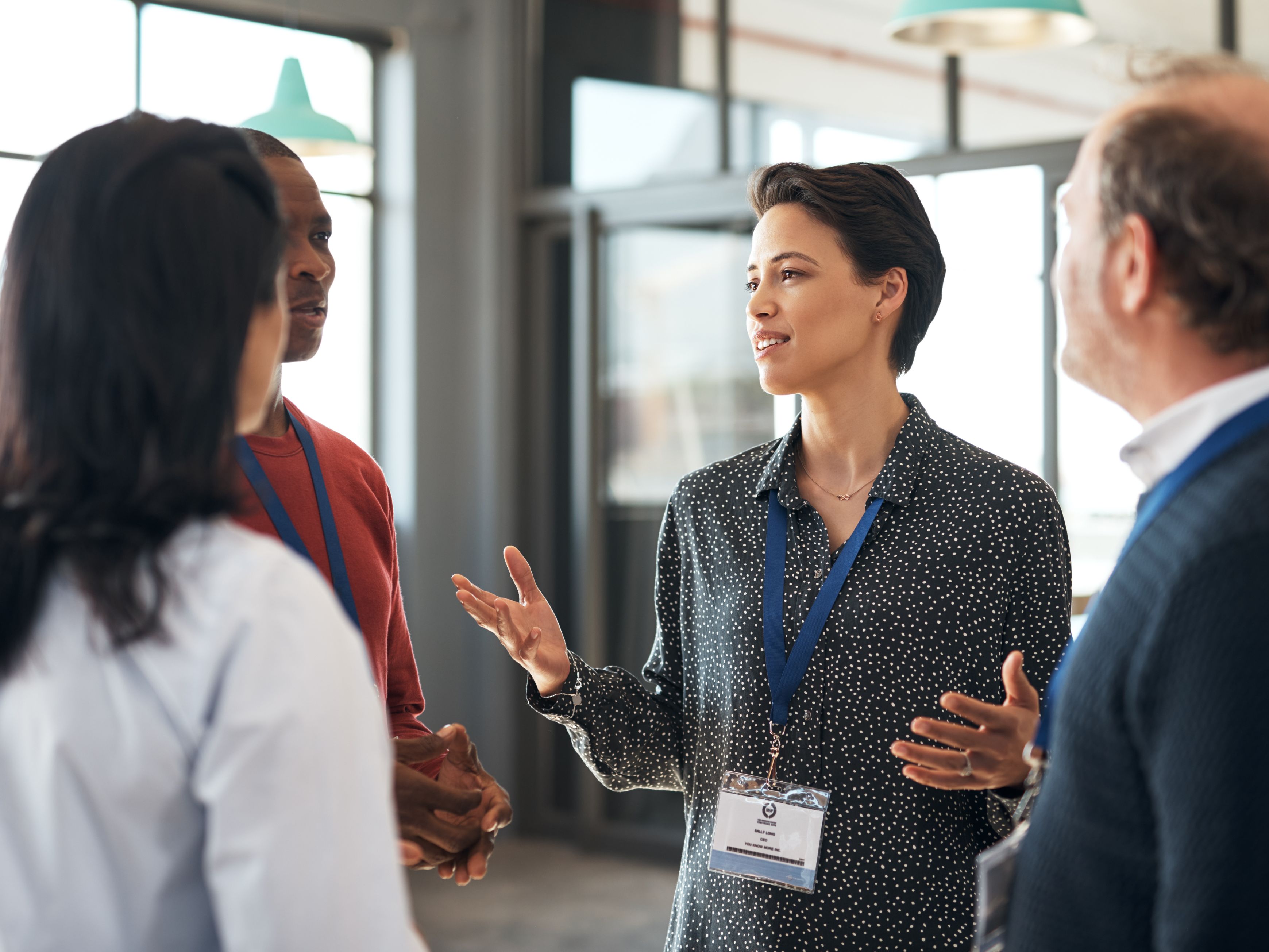 People talking at a business conference.