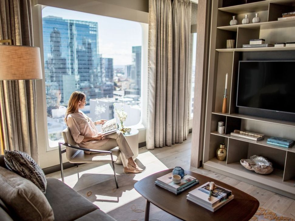 guest sitting in hotel room