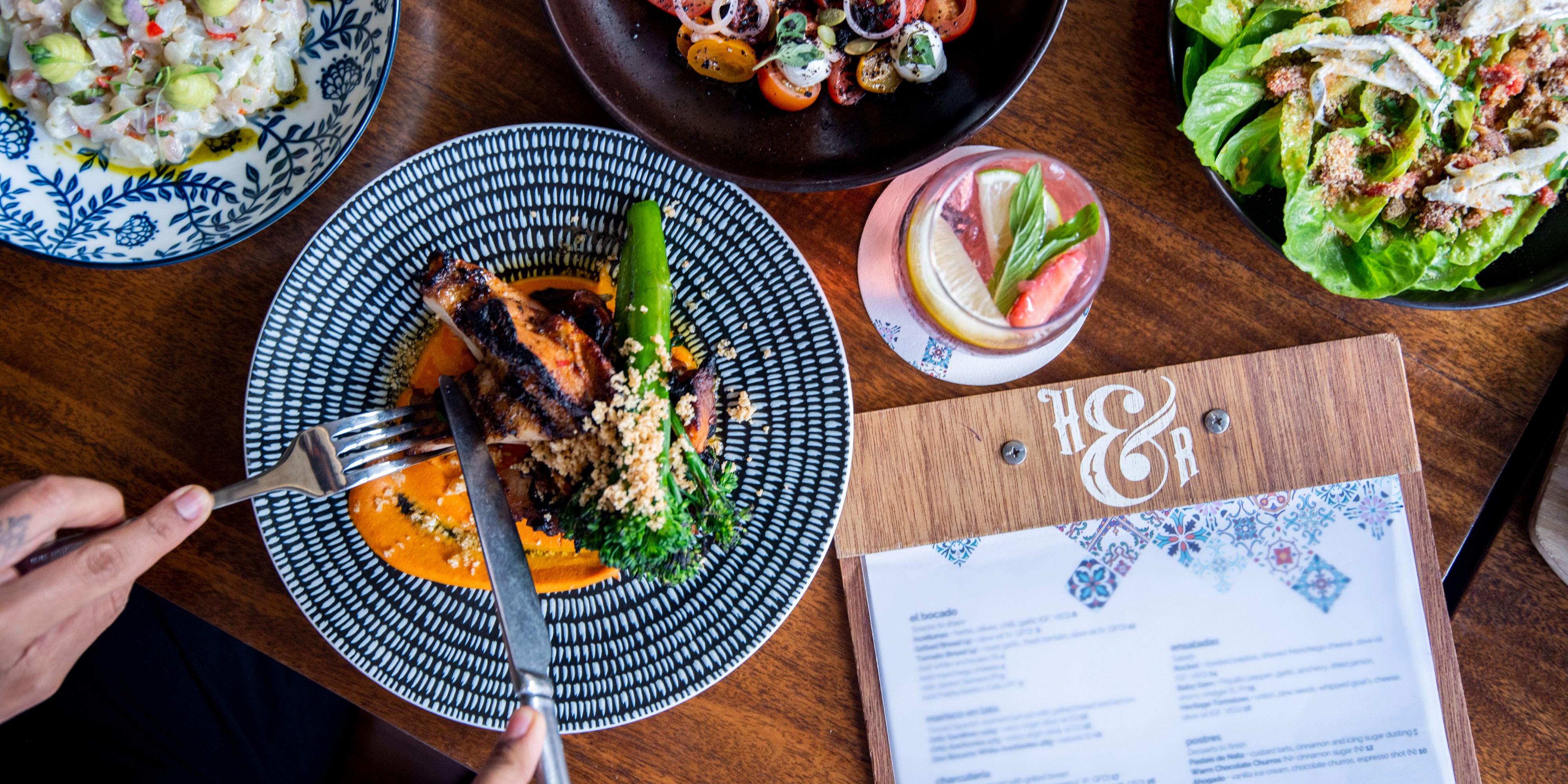 guest cutting into food