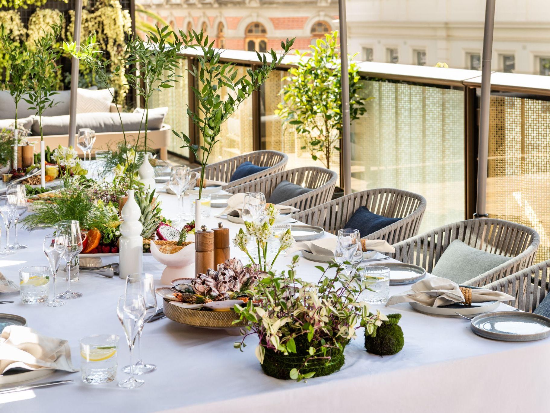 long table set up with decor and plates