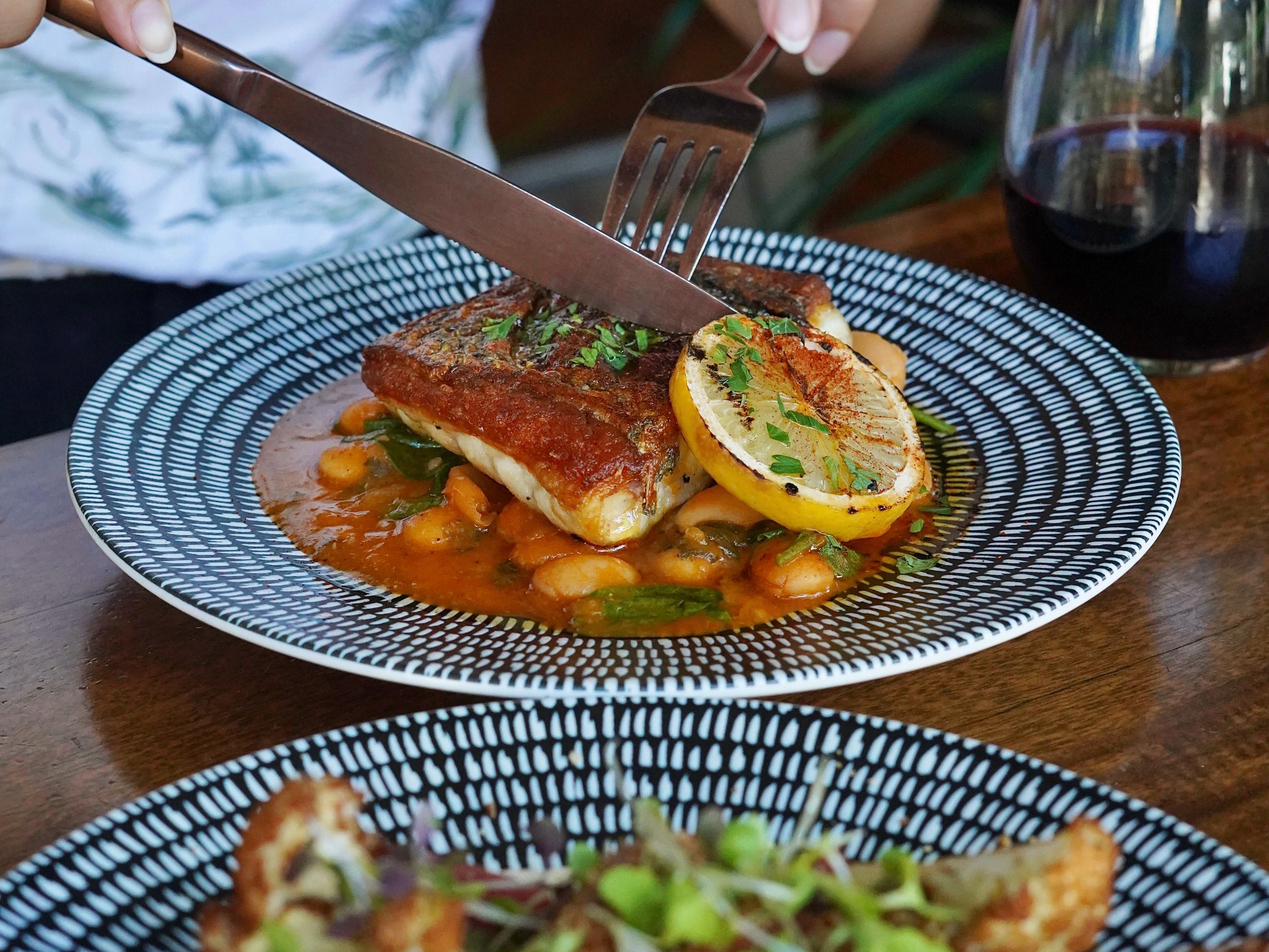 guest cutting into lunch special