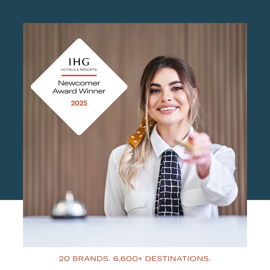Photo of a woman welcoming a guest at a hotel. Text reads: IHG HOTELS & RESORTS. Newcomer Award Winner 2025. 20 BRANDS. 6,600+ DESTINATIONS.