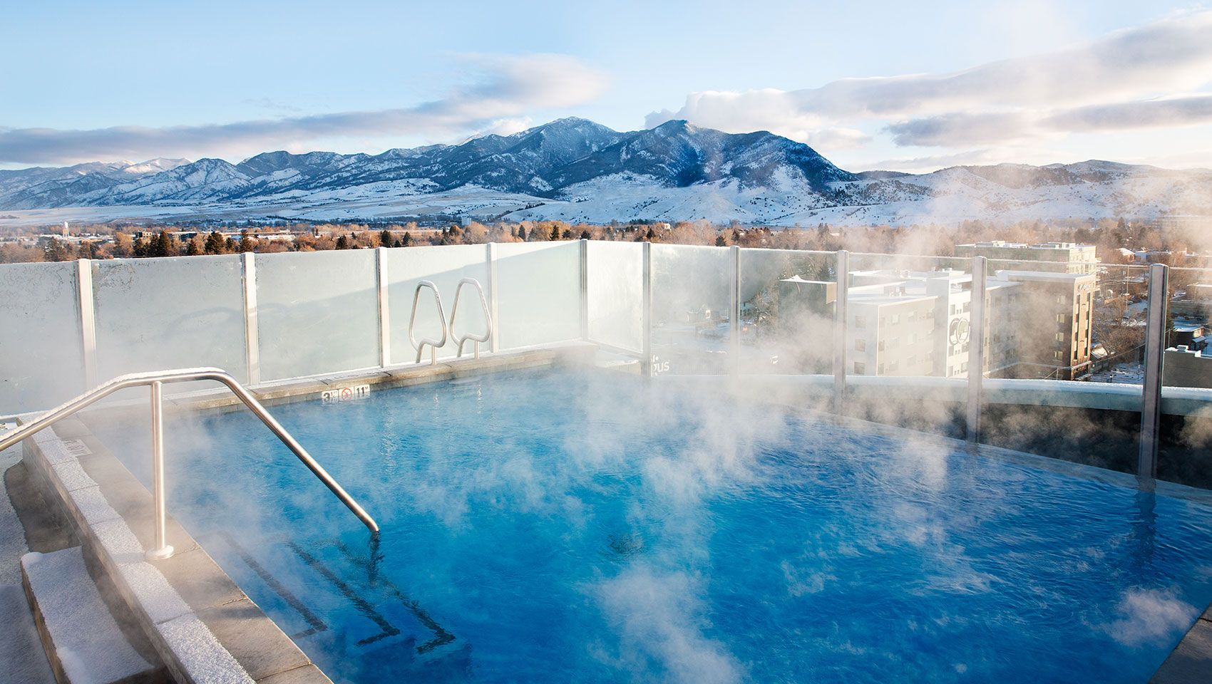 rooftop pool with views of the mountains in bozeman