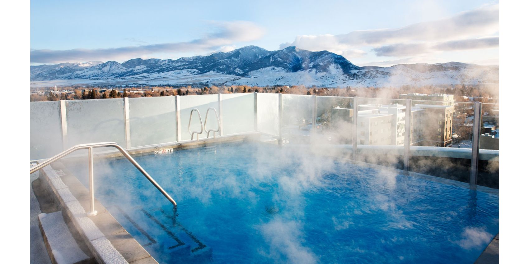 rooftop pool with views of the mountains in bozeman