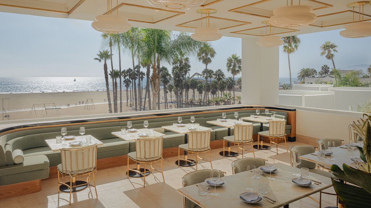 covered outdoor restaurant overlooking glistening pacific ocean