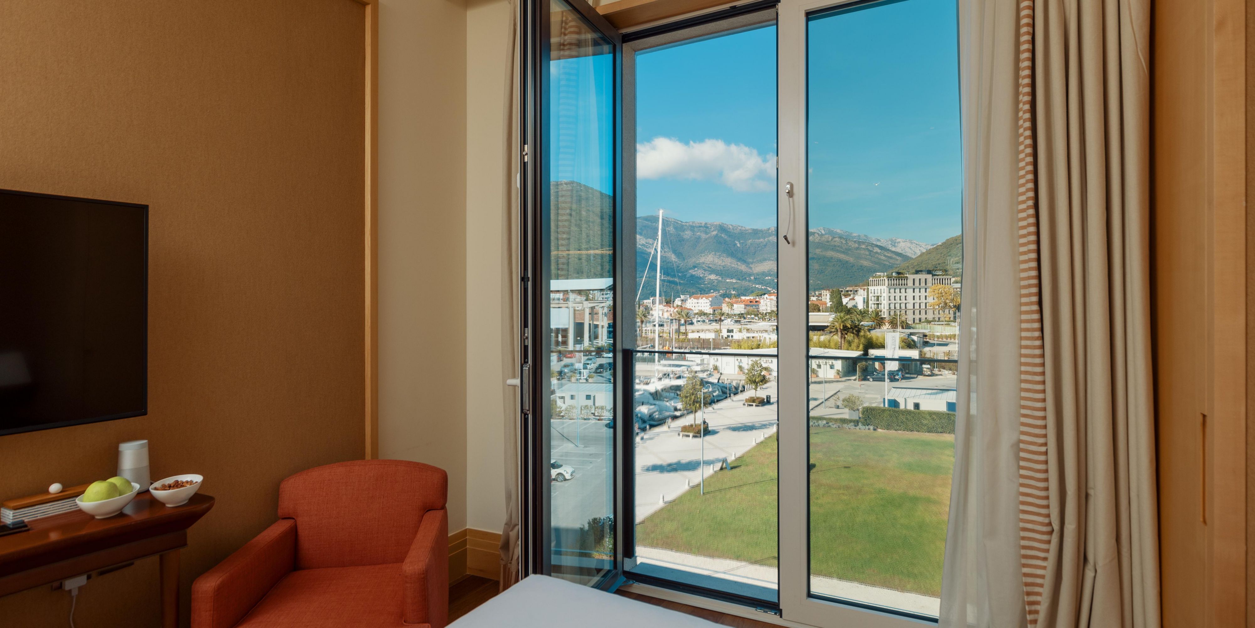 Room views vary, with some overlooking neighboring buildings
