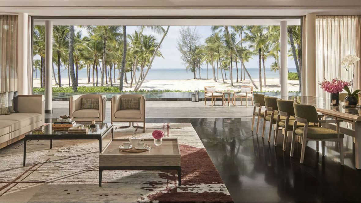 indoor lobby with open air access to courtyard and ocean views