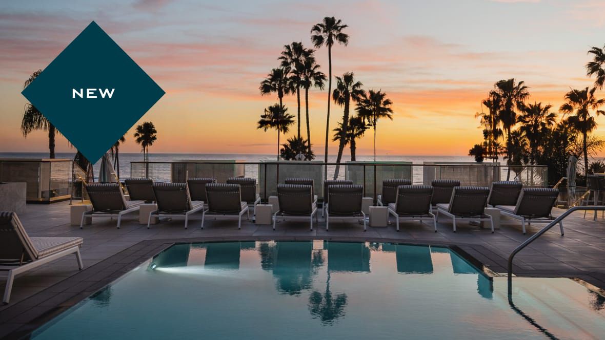 The new hotel Regent Santa Monica Beach’s pool deck overlooking the ocean at sunset