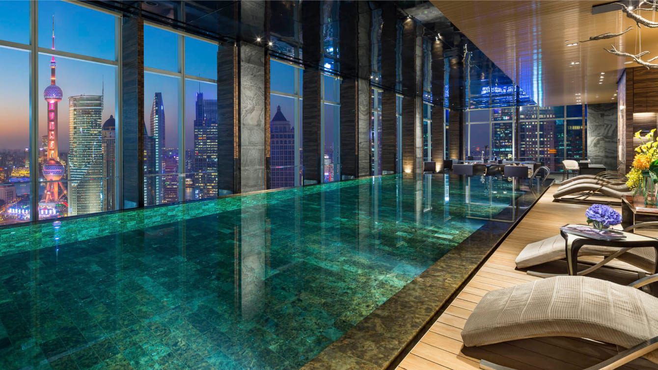 An indoor pool above Shanghai offers stunning nighttime views