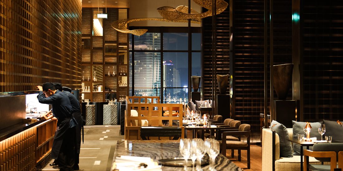 An elegant dining destination where sophisticated interiors meet breathtaking city views.