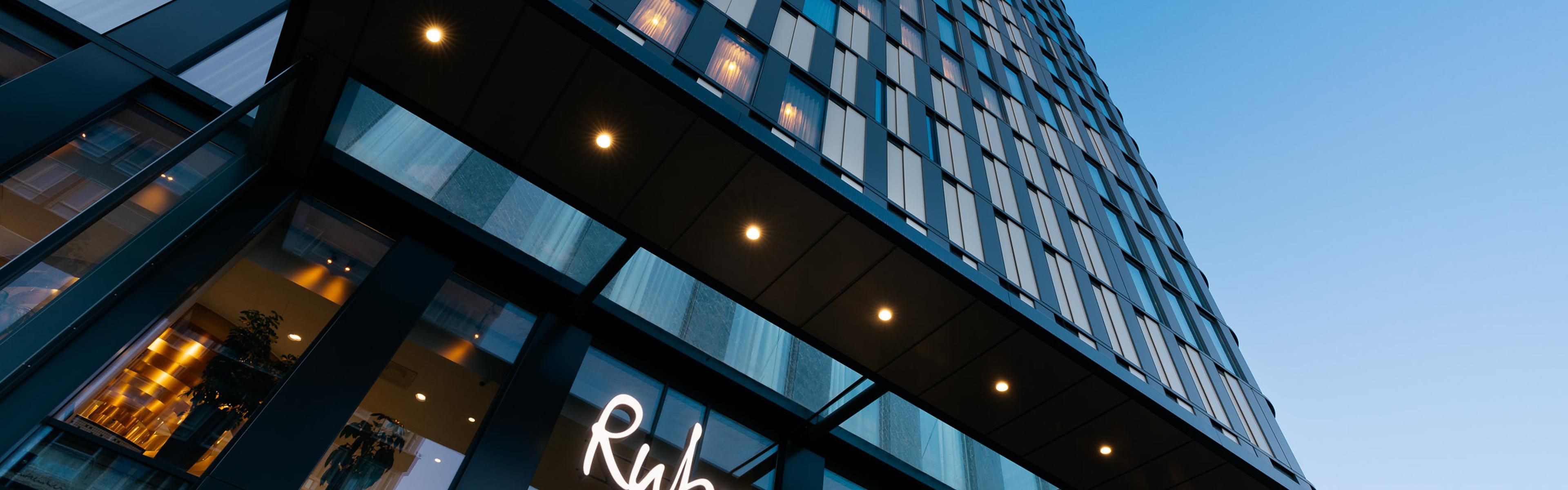 Ruby Emma Hotel Amsterdam | Modern facade at dusk