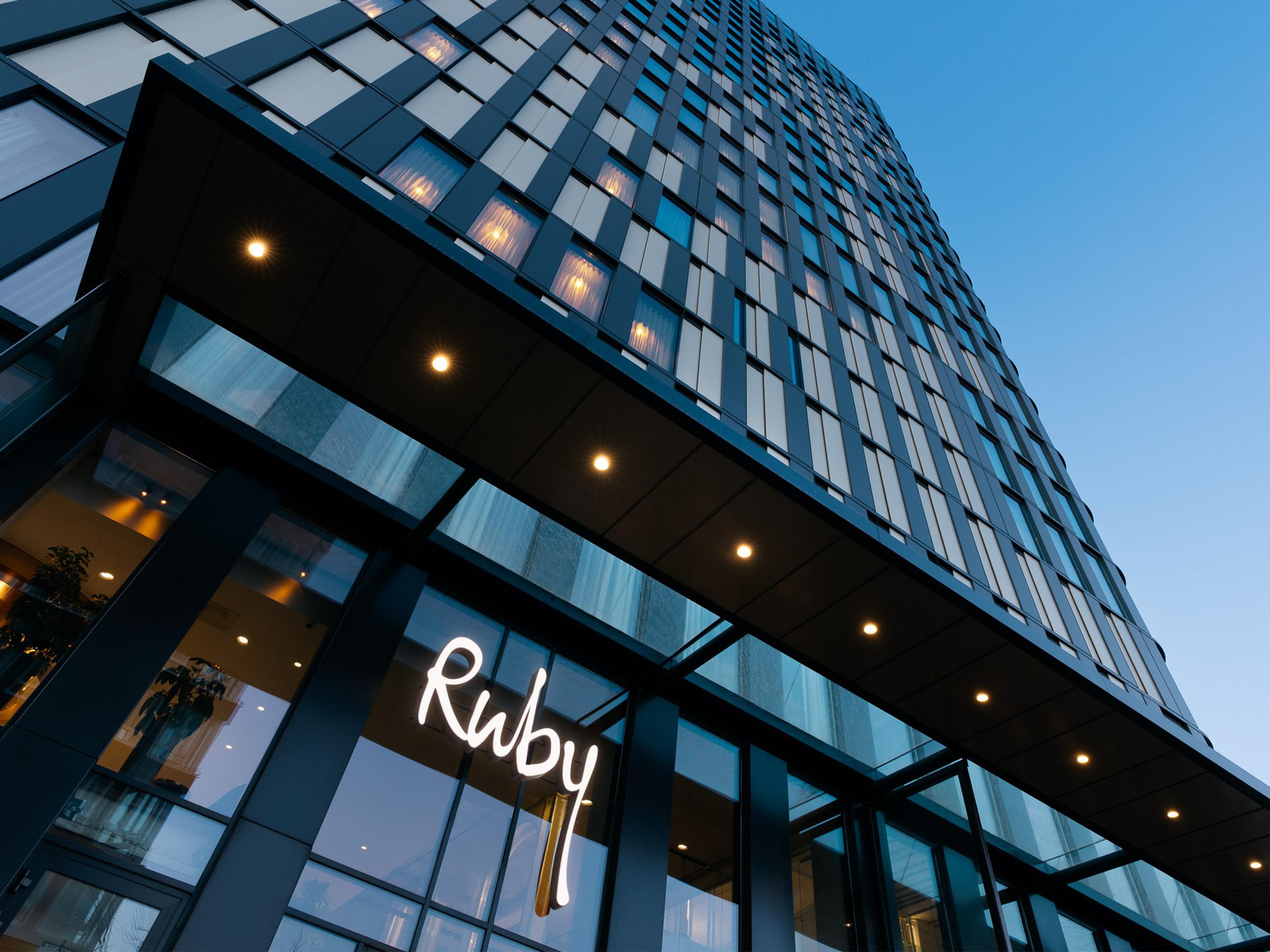 Ruby Emma Hotel Amsterdam | Modern facade at dusk
