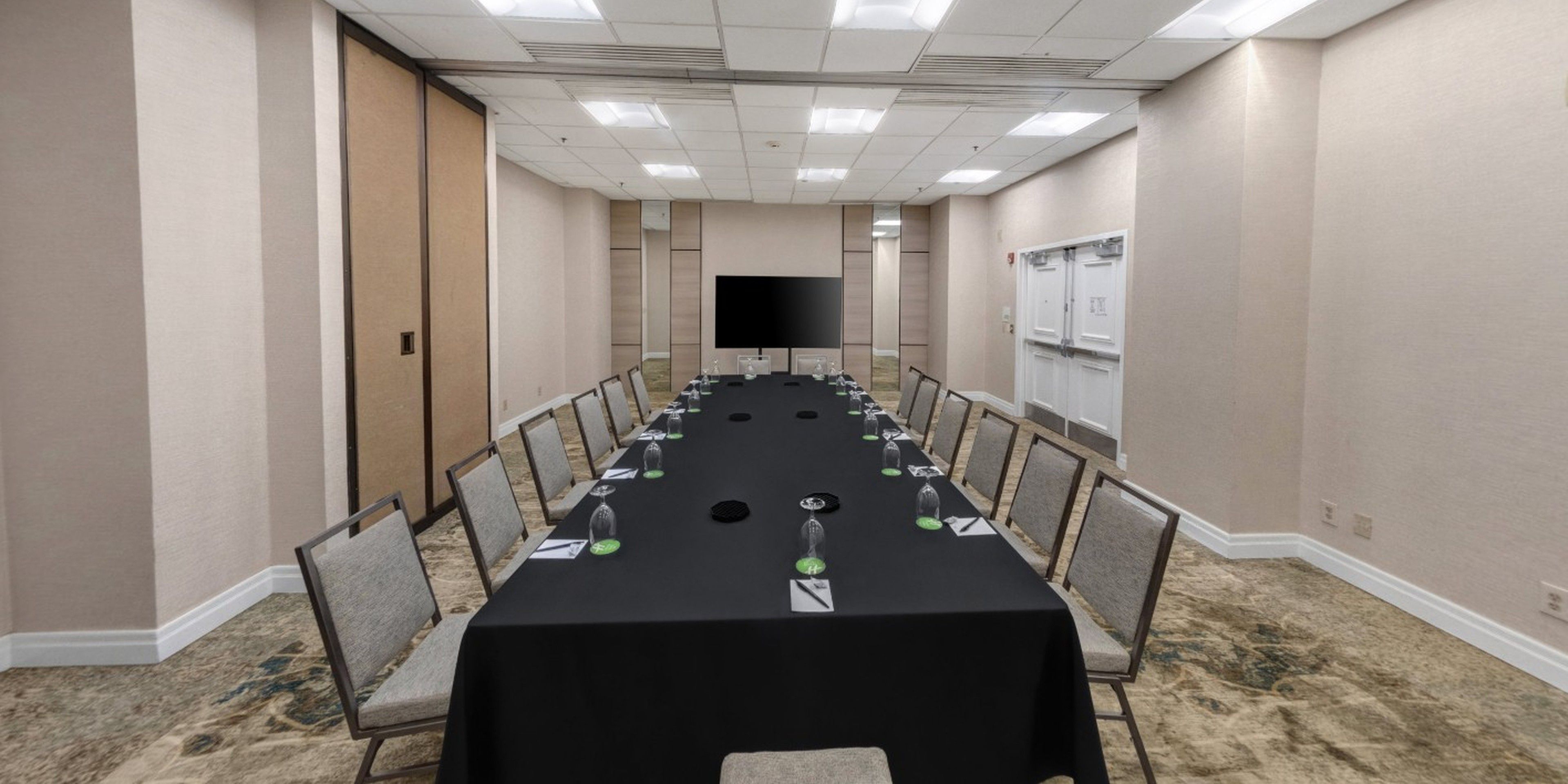 San Antonio boardroom with a long table and a tv