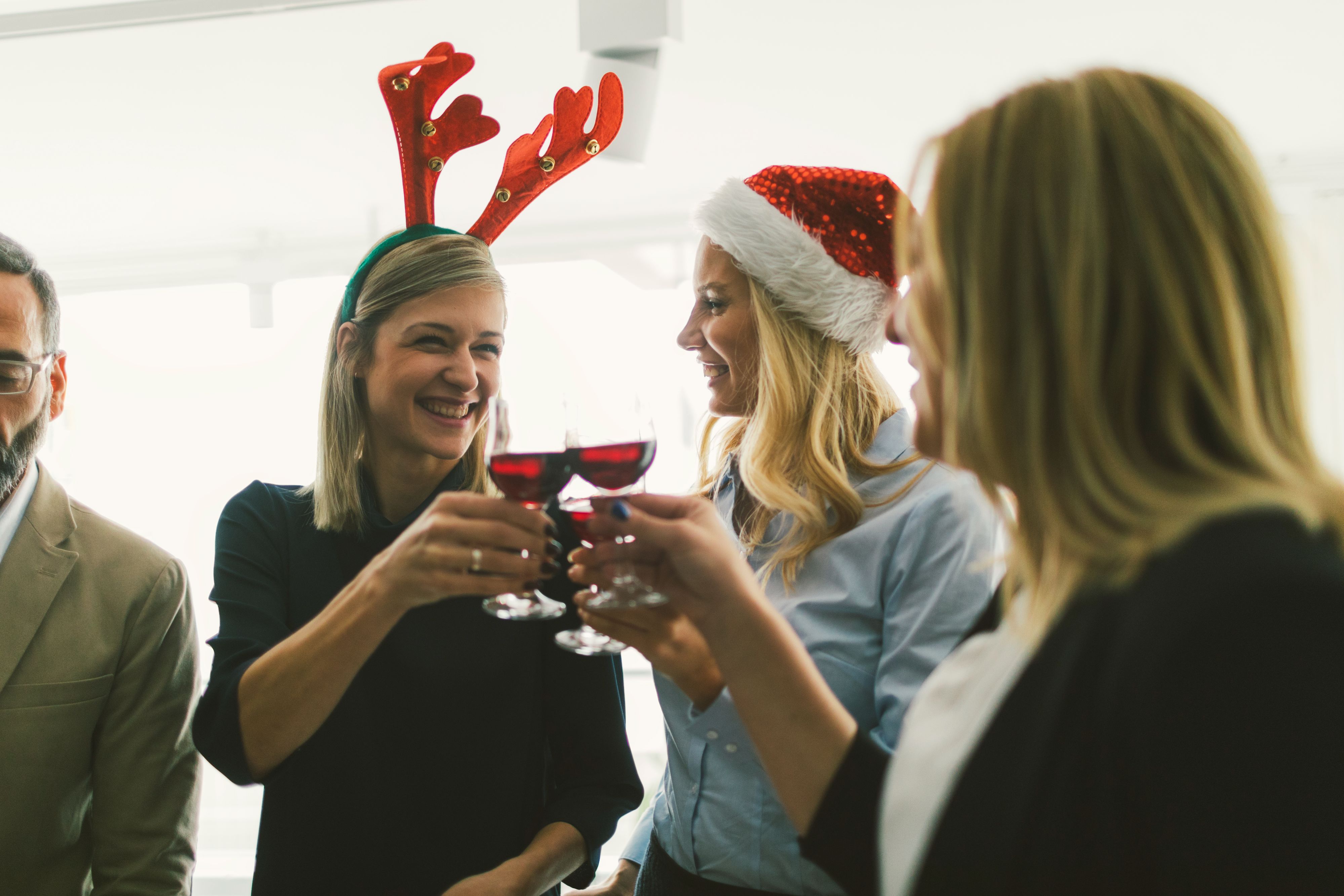 Friends enjoying a holiday party.