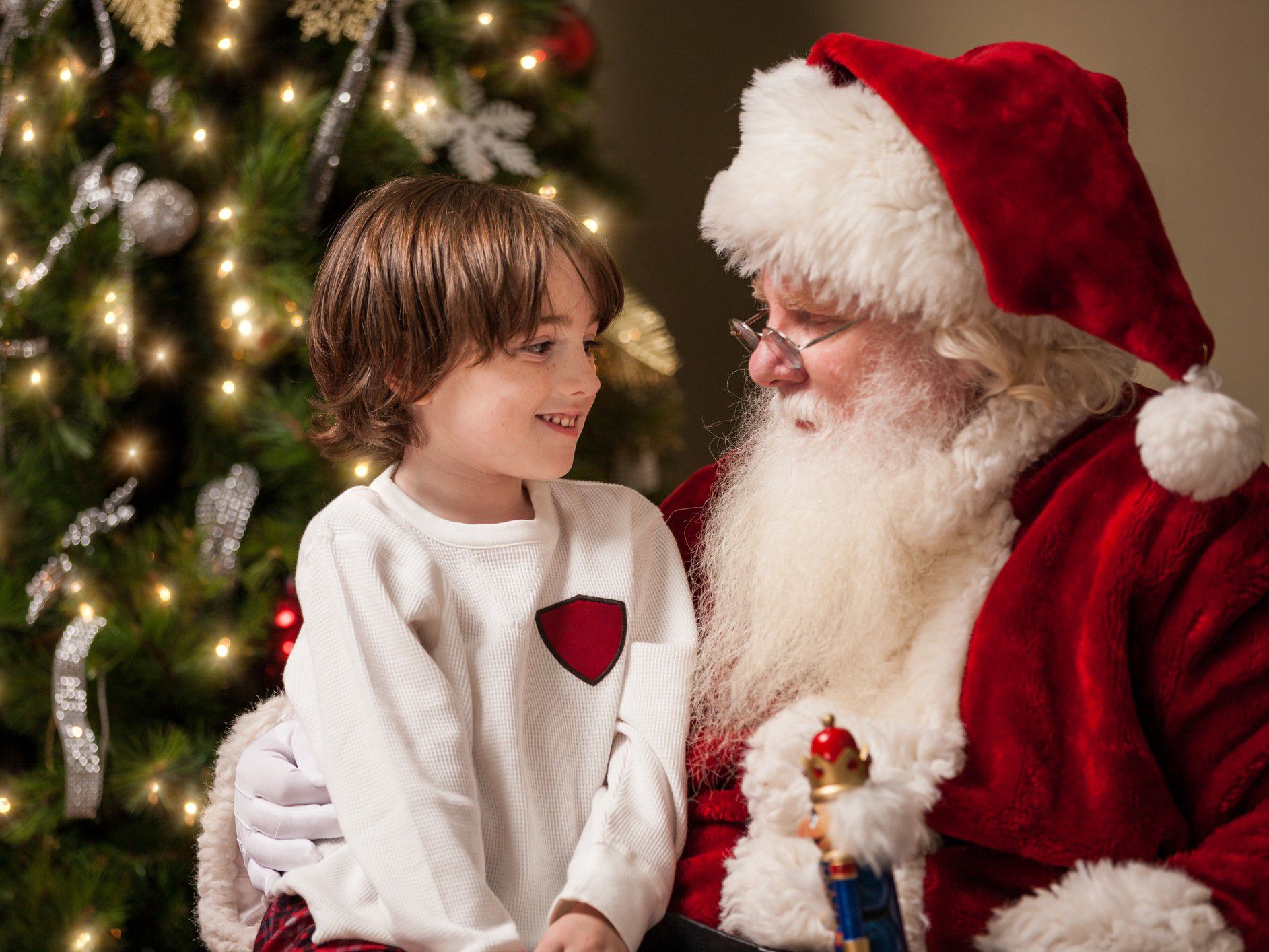 santa with little boy in lap