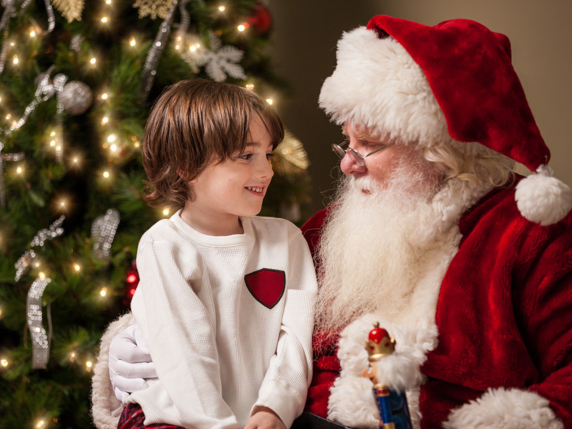 Child sitting on Santa's lap 