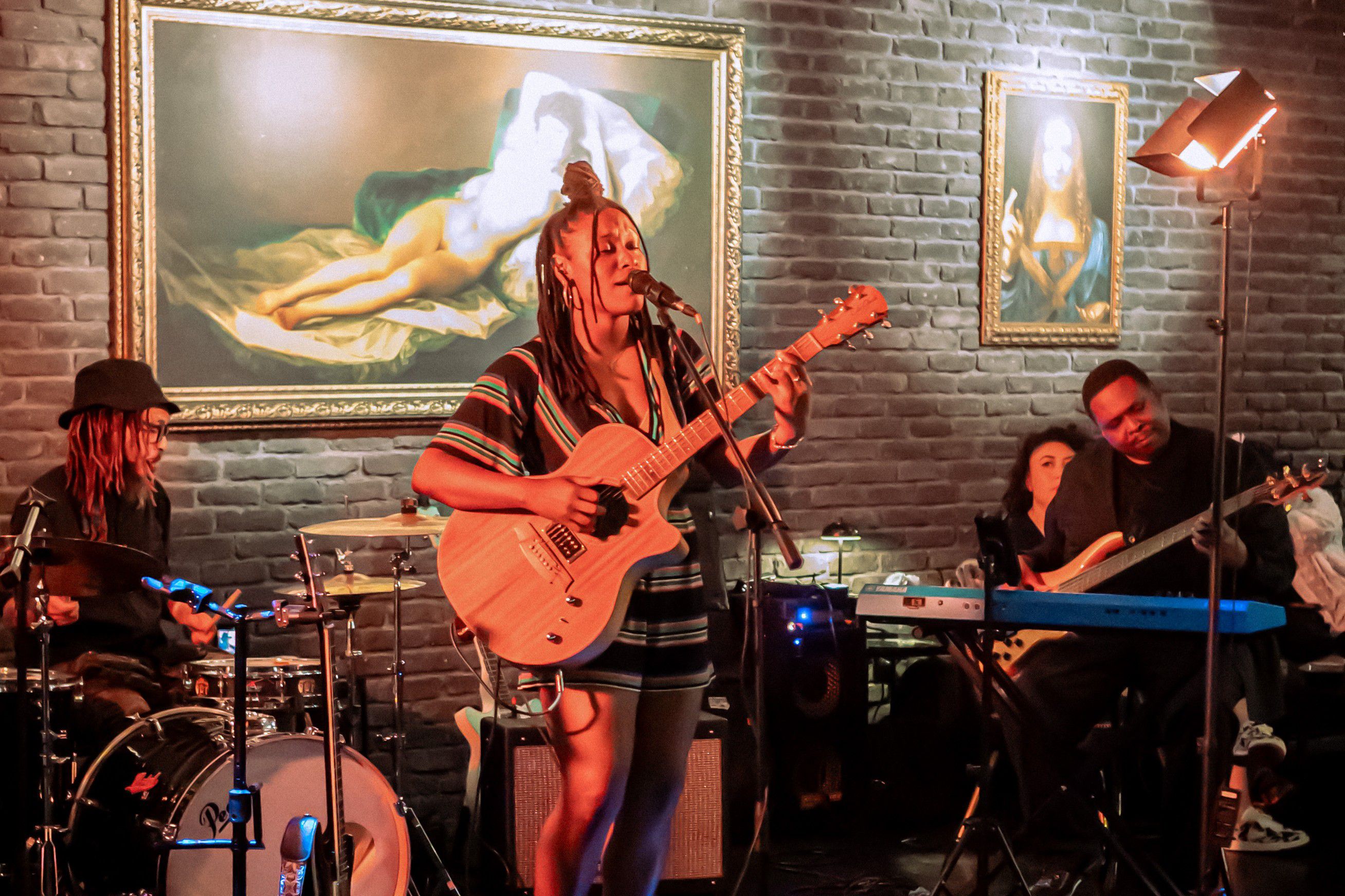 Live band performing on stage in an intimate music venue