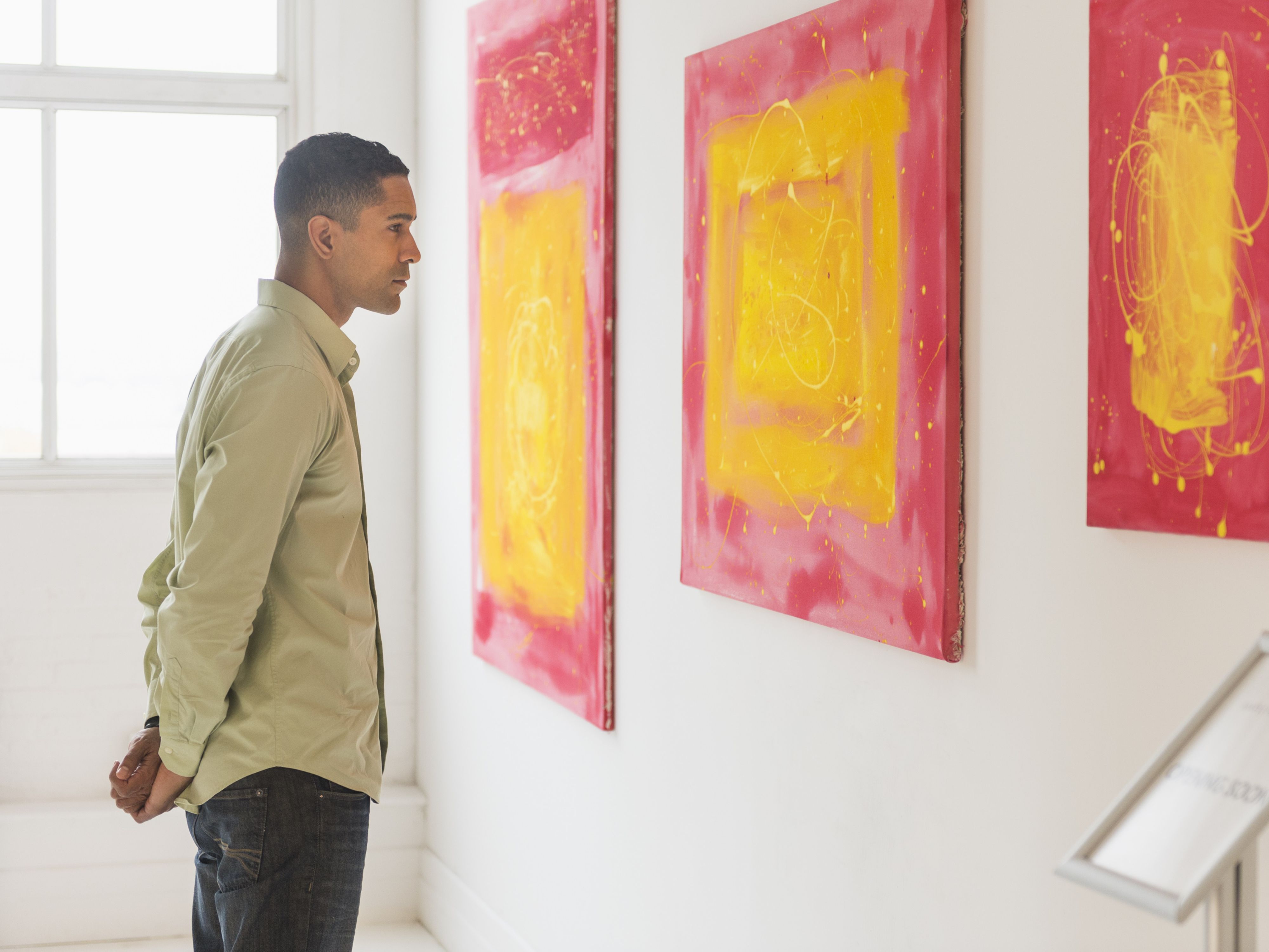 Man admiring art in a museum